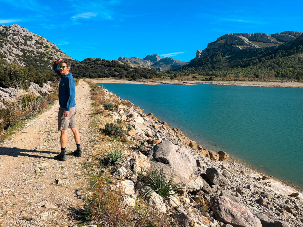 man walking on the Cúber Reservoir Circuit Trail 