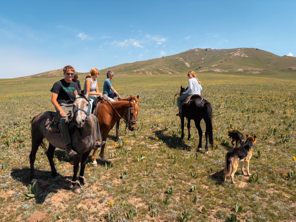 Riding Horses at Song Kul Lake